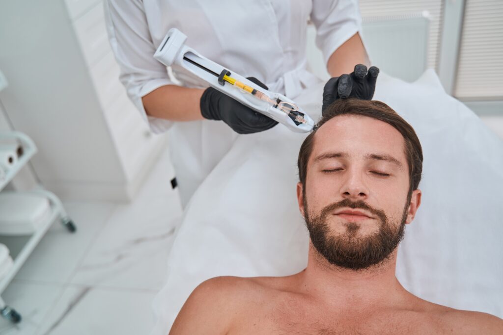 Man,Being,Treated,For,Hair,Loss,In,A,Beauty,Clinic